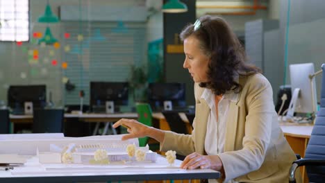 female executive working at table in the office 4k