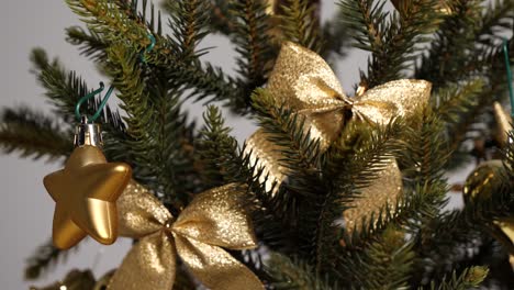 christmas tree with gold star and bow tie