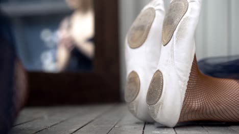 ballet dancer's feet resting