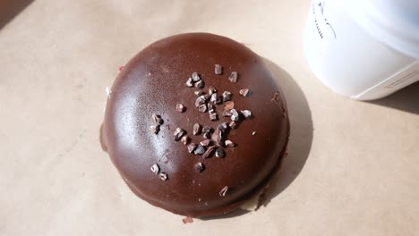 chocolate donut with coffee cup