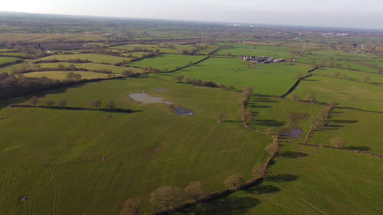Aerial perspective over Cheshire countryside and farmland in East Cheshire, North of Haslington Village - Cheshire, UK