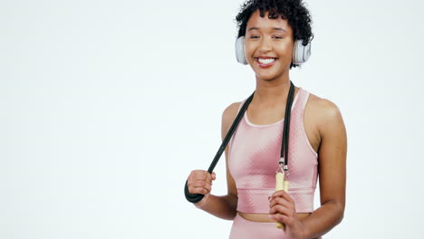 Jump-rope,-happy-and-woman-with-headphones