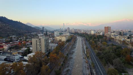 aerial view of santiago, chile at sunset with andes mountains in background