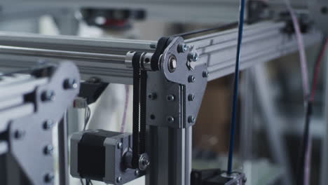 close-up of a 3d printer's mechanical components