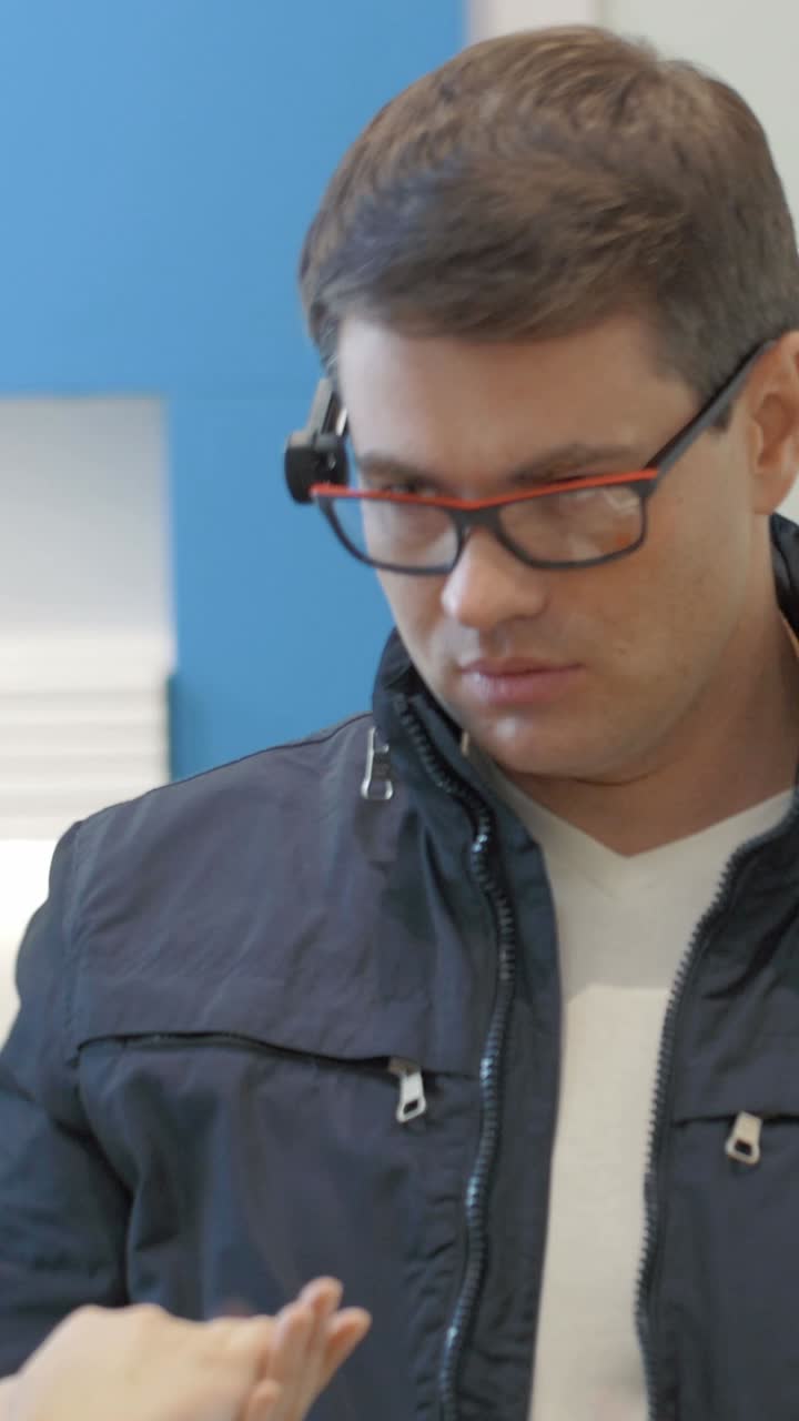 Man trying on eyeglasses
