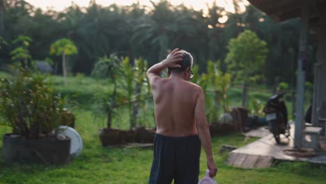 farmer watering plants