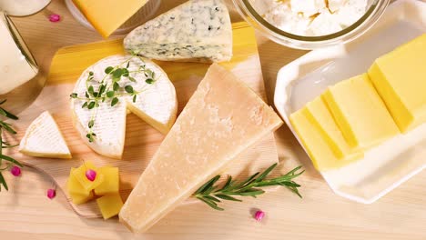 assorted dairy items displayed on a wooden surface