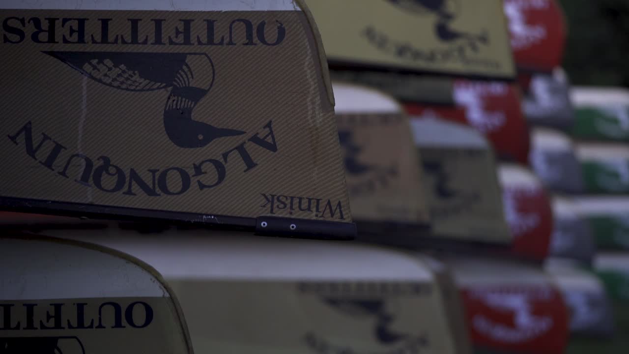 Canoes Stacked At A Outfitter In Algonquin Provincial Park, At Night
