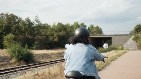 Happy-woman-on-the-electric-scooter