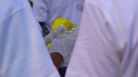 wearing-gloves-closeup-view-in-a-Mahim-beach