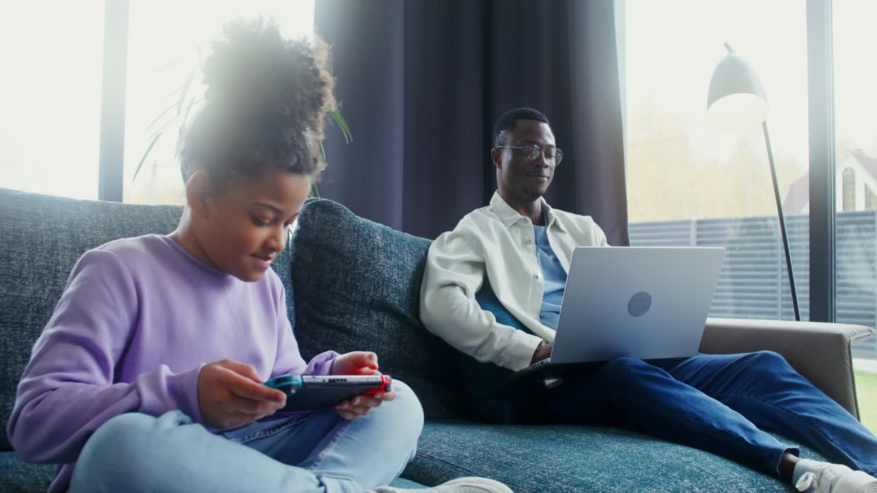 Father and Daughter Enjoying Leisure Time at Home