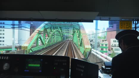 driver view of railway train track in tokyo, japan