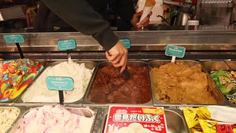 hand scooping chocolate tiramisu ice cream in melbourne