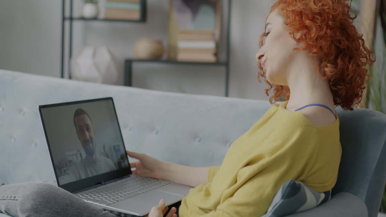 Woman and Man Having a Video Call