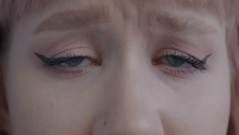 close-up of a woman with sad expression