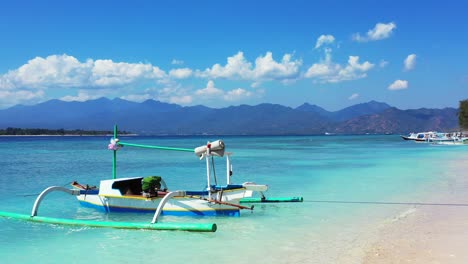 Kalimantan-Island,-Asia---The-Beautiful-Scenery-of-A-Boat-Floating-by-the-Sea-With-Cloudy-Blue-Sky-Above---Wide-Shot