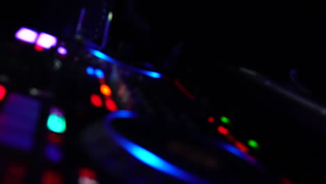 rolling kaleidoscope bokeh shot of a dj booth in a night club, hd 1080p, 59.94p b roll