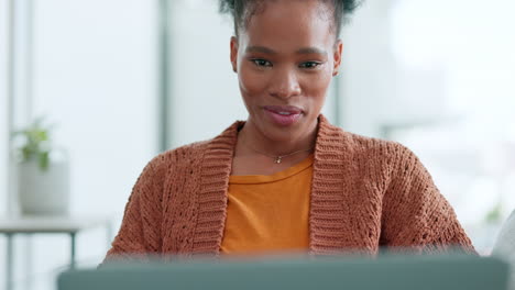 woman online shopping on laptop in home living