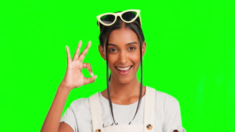 ok hand, happy and face of indian woman on green