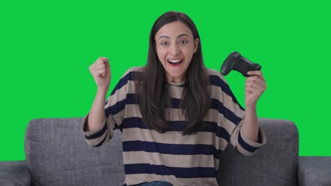 Happy-Indian-girl-wins-a-video-game-Green-screen