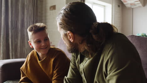 Caucasian-man-and-boy-in-the-living-room