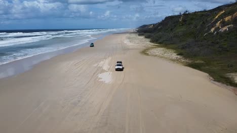 drone shot: driving on fraser island, australia