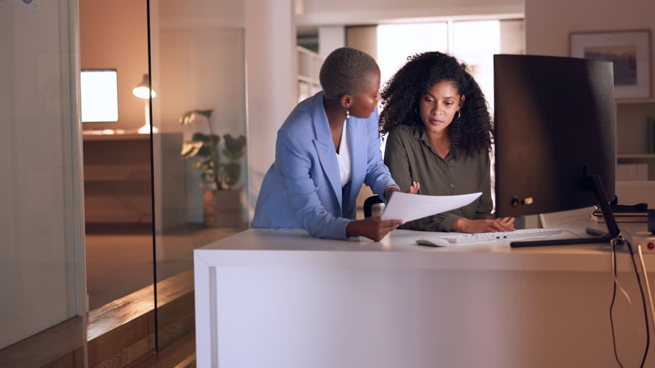 Business woman coaching worker at night modern