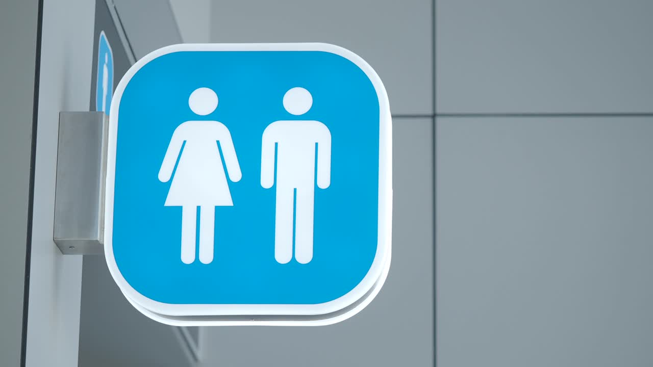 señal de baño público