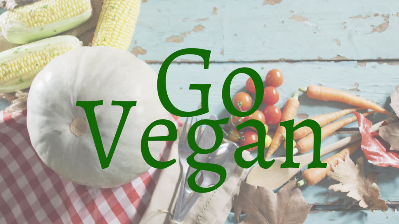 Animation des Textes 'Go Vegan' über frischem Gemüse