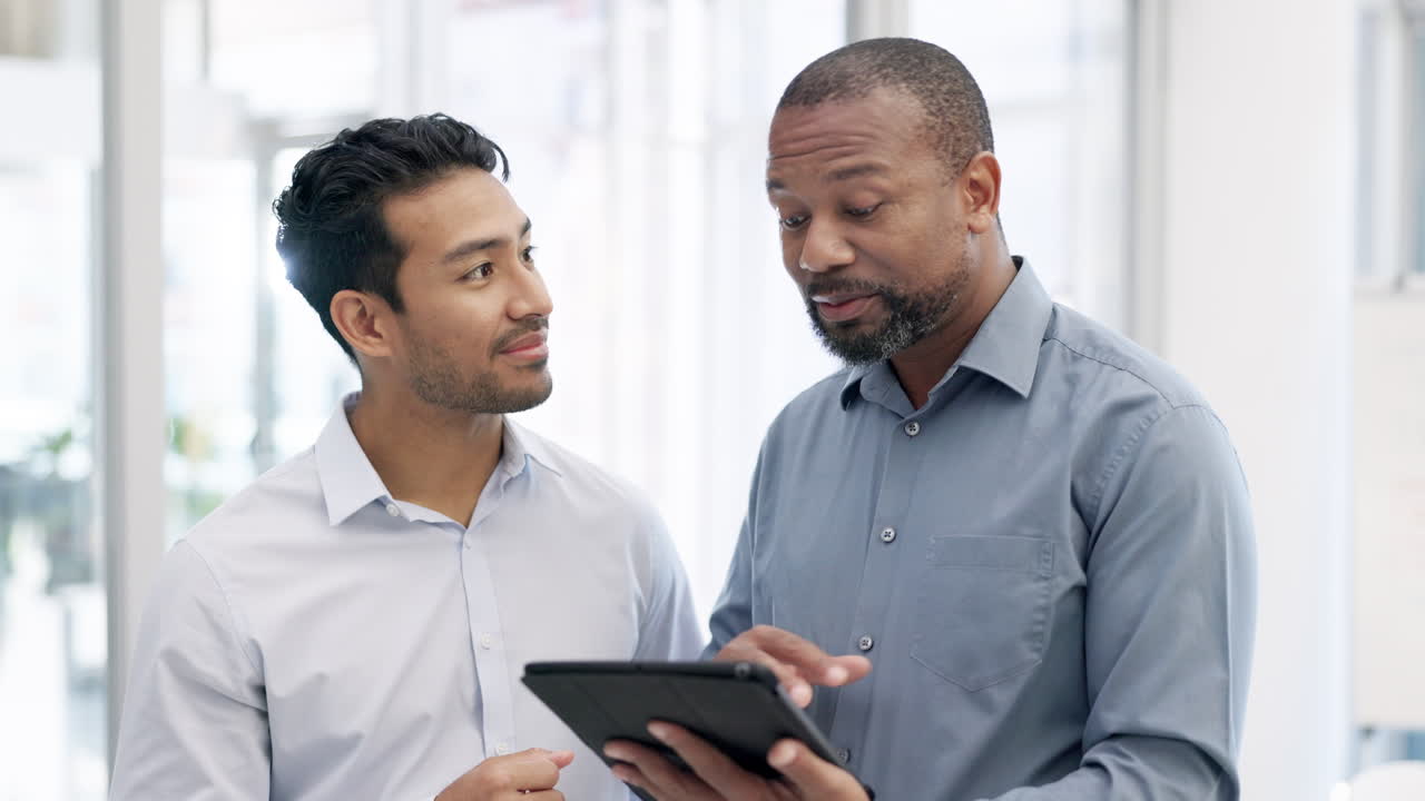 Meeting, tablet and business men in discussion