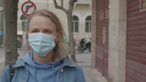 woman putting on bite splint and face mask covid-19 lifestyle