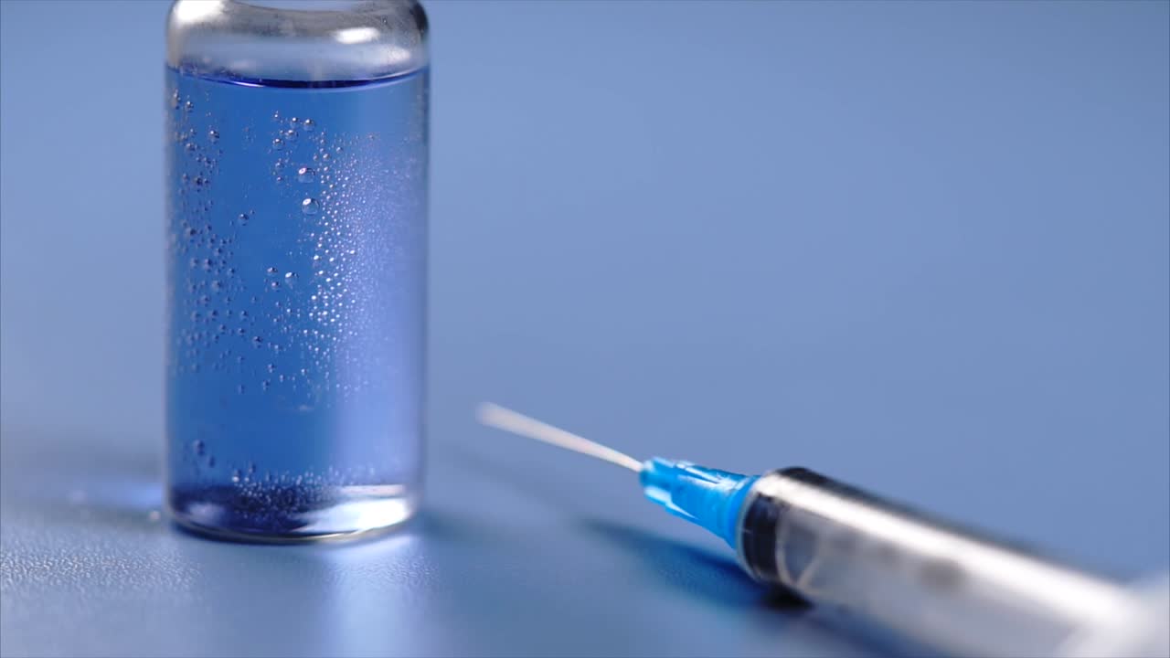 Vaccine Vial and Syringe