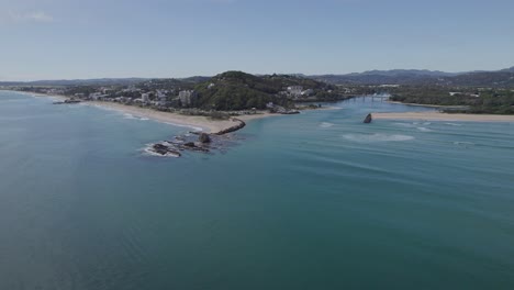 currumbin creek meets the coral sea in gold coast, queensland, australia