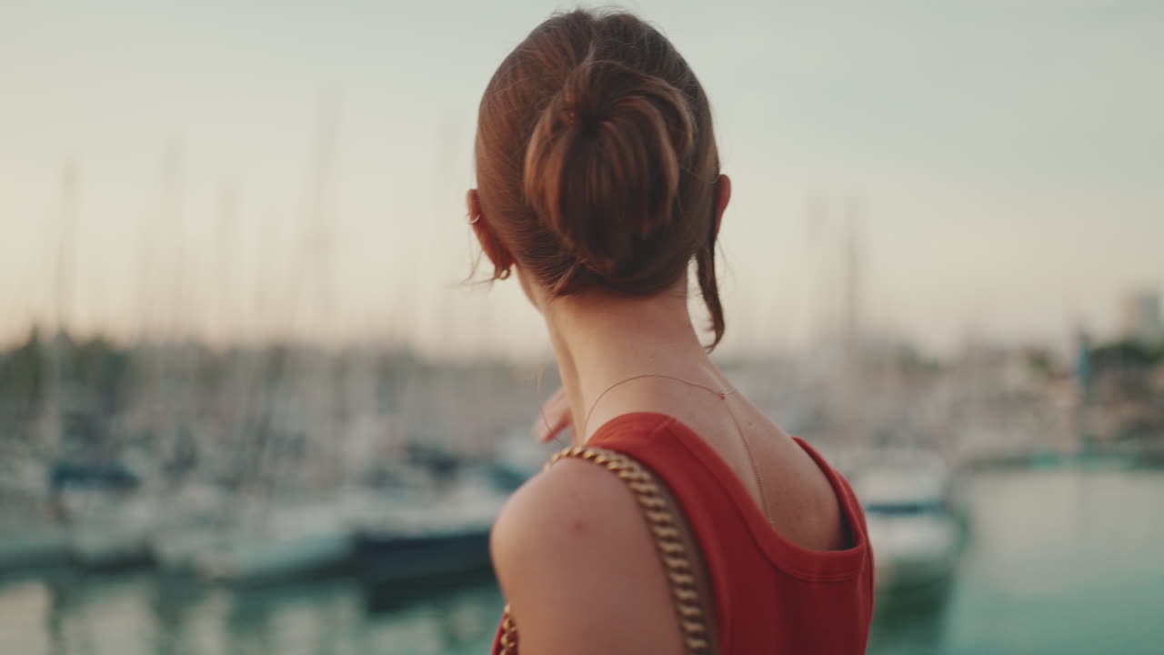 Woman looking out at the harbor