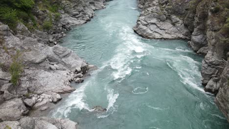 flying downstream in the stunning kawarau river, new zealand