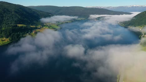 aerial footage beautiful nature norway over the clouds.