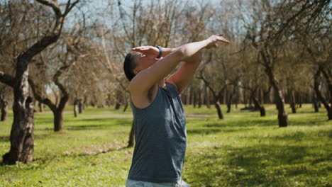 man stretching outdoors