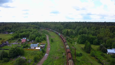 train passing through rural forest