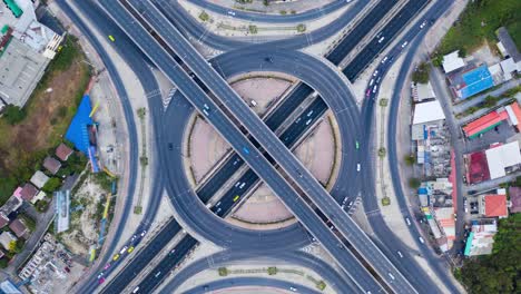 aerial view of traffic time lapse on intersection circle.