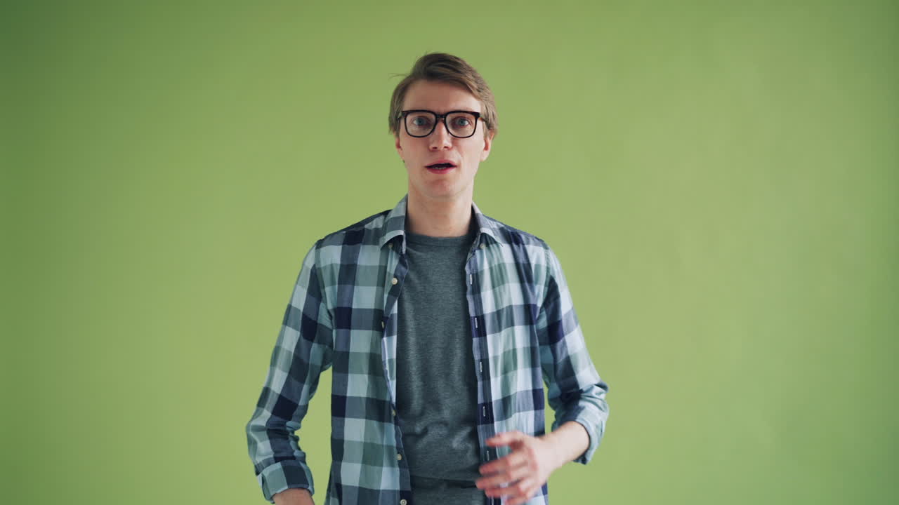 Surprised Man in Plaid Shirt