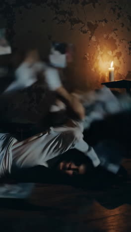 a person in motion in a dark room