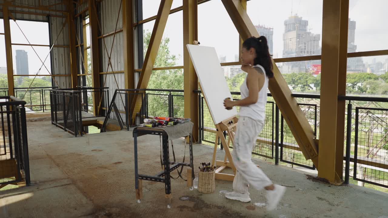 An Artist Arranges Supplies Before Painting Outdoors