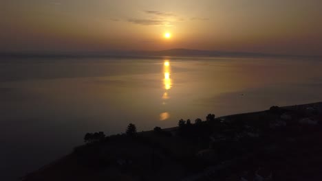 sunset in mediterranian from above capturing greek islands and aegean sea next to halkidiki beautiful, drone