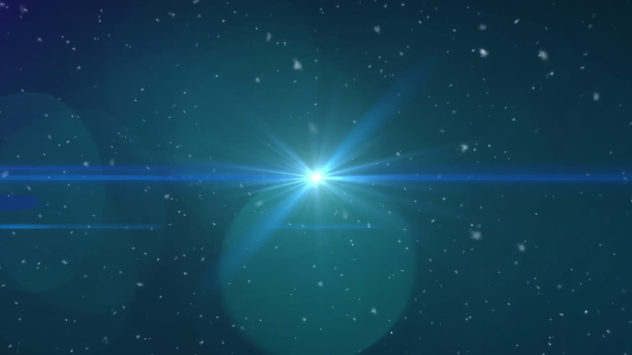 검은 바탕에 초록색 반 ⁇ 이는 빛 반점과 렌즈 플레어