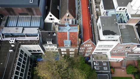 the drone is flying topdown over the house of anne frank in amsterdam the netherlands aerial footage 4k