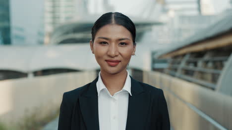 confident businesswoman in cityscape