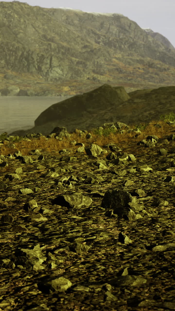 Majestic mountain landscape beside a tranquil lake at dusk