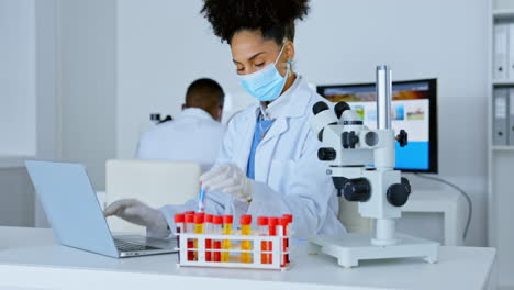 woman, scientist and laptop with vial sample