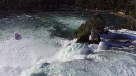 slow motion: close up aerial shot of the roaring waterfall rheinfall at schaffhausen in switzerland