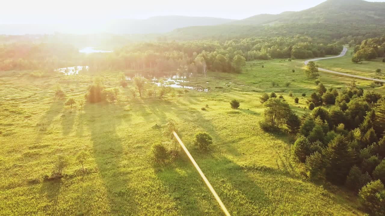 Canaan Valley Landscape With Shadows Backlit Sunrise Epic Road Cinematic Aerial 4K